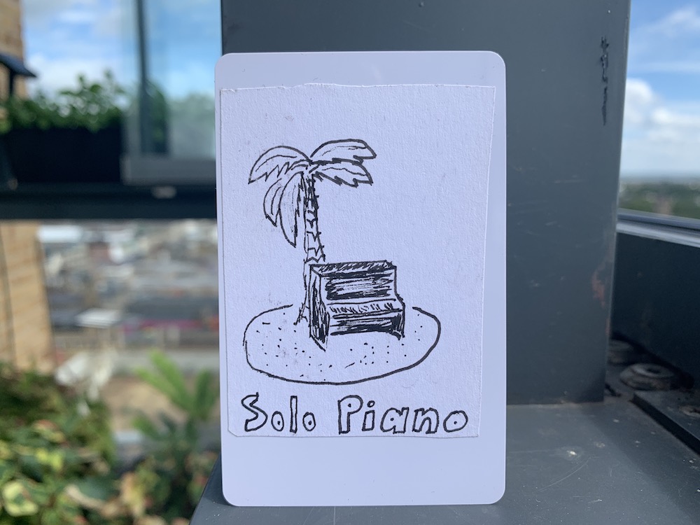 A sample music card, with "solo piano" as the subject